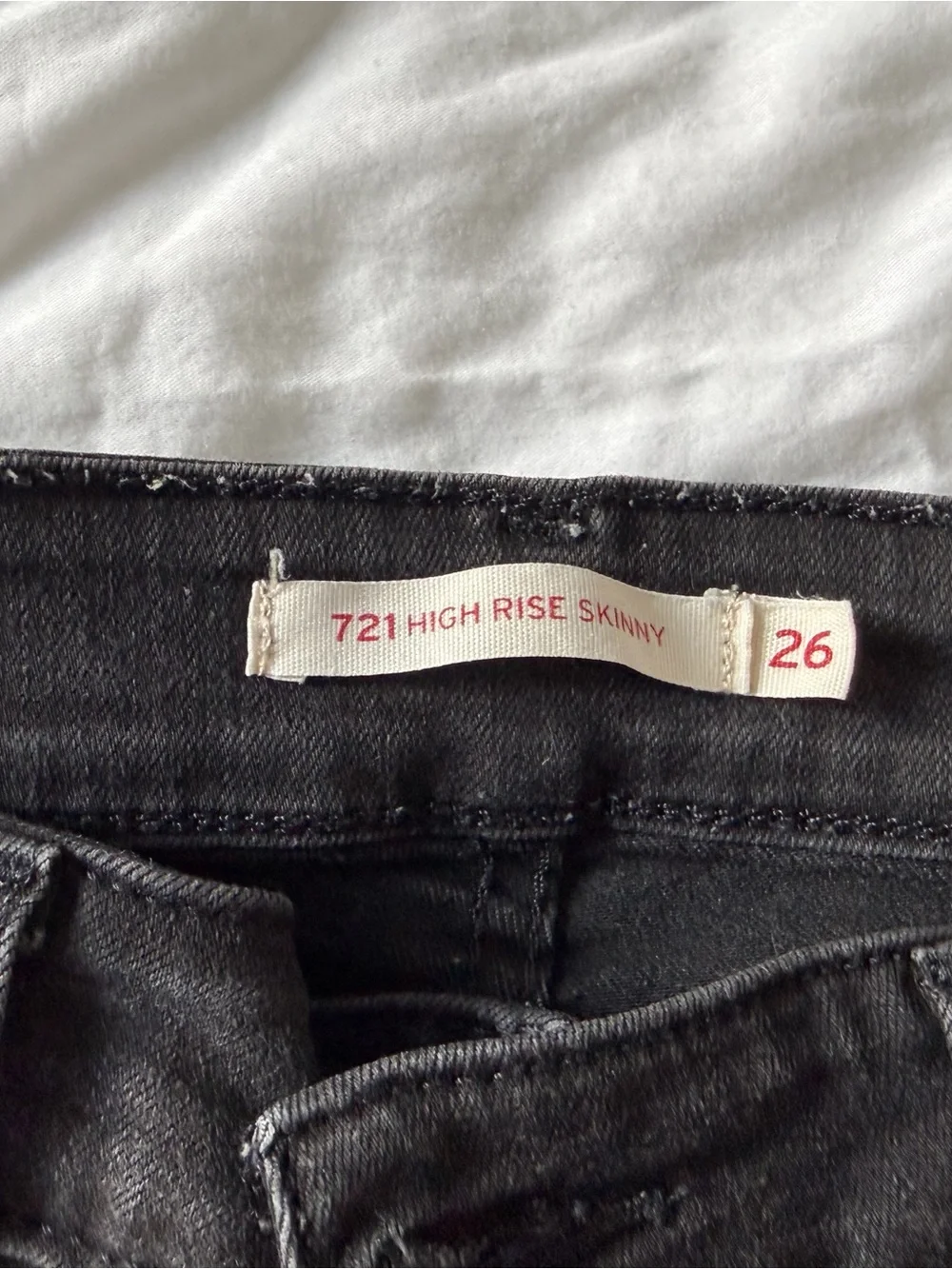 8 pairs of worn Levi black jeans - Size 26
